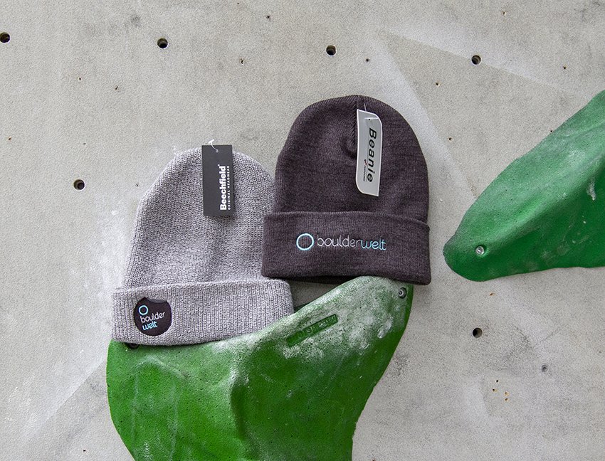 Unsere Boulderwelt Produkte wie die kuscheligen Mützen aus unserem Shop
