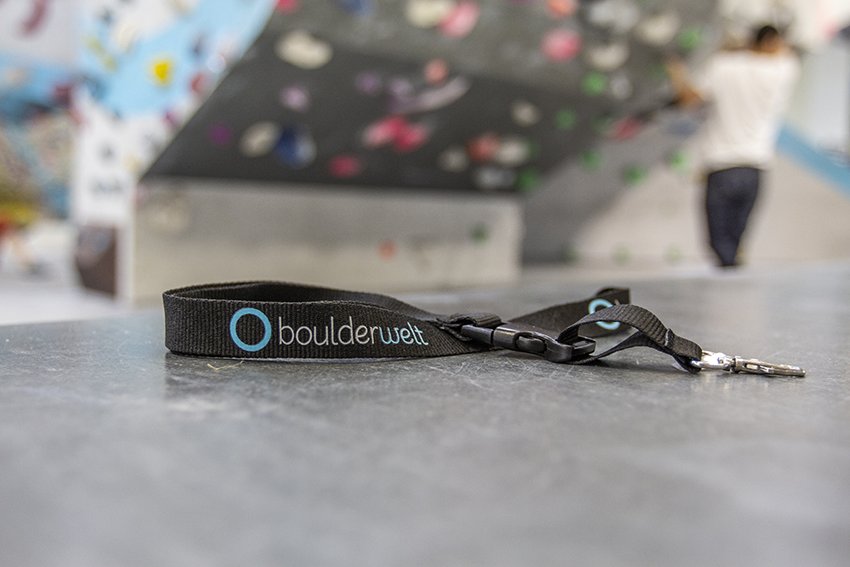 Unsere Boulderwelt Produkte wie das Schlüsselband aus unserem Shop